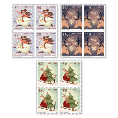 Série de blocs de quatre «Noël – Salutations festives» Série de blocs de quatre (12 timbres, valeur d'affranchissement CHF 15.20), autocollant, non oblitéré