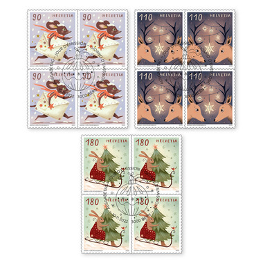 Série de blocs de quatre «Noël – Salutations festives» Série de blocs de quatre (12 timbres, valeur d'affranchissement CHF 15.20), autocollant, oblitéré